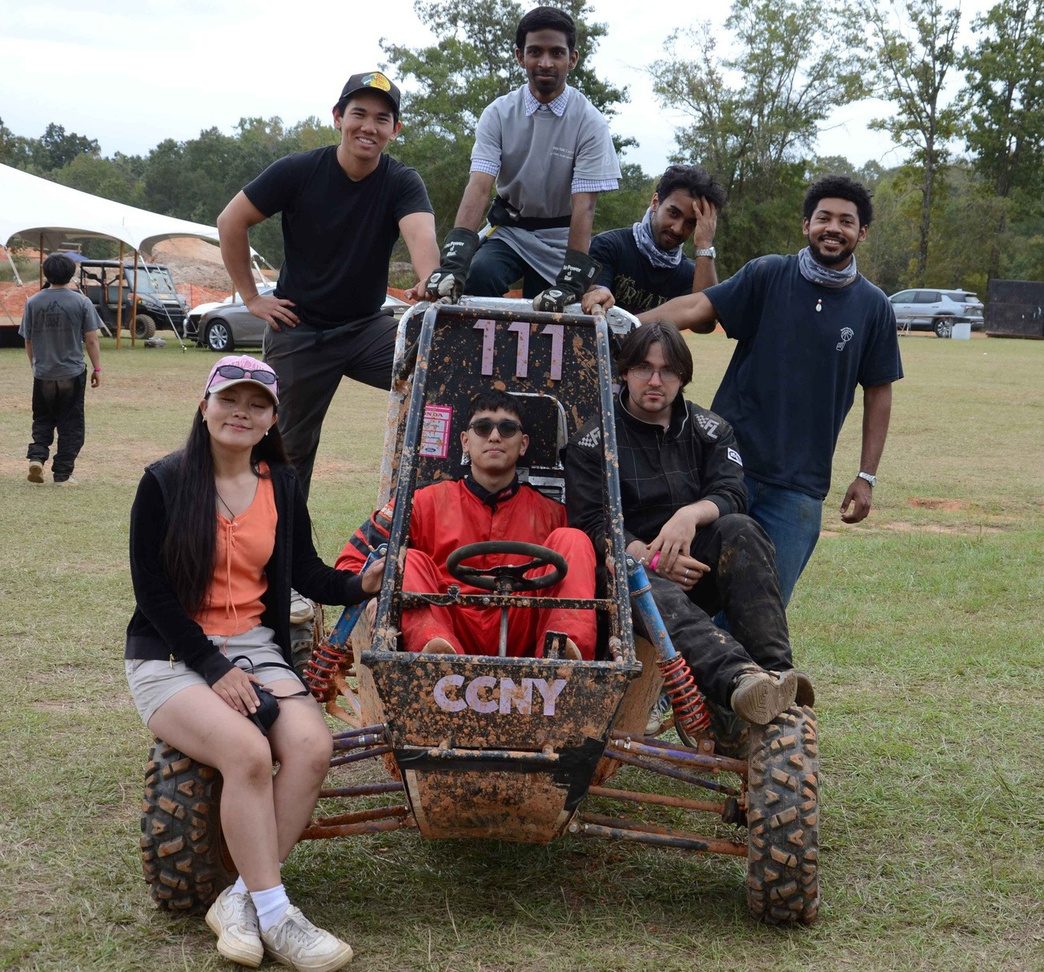 Team portrait with the car